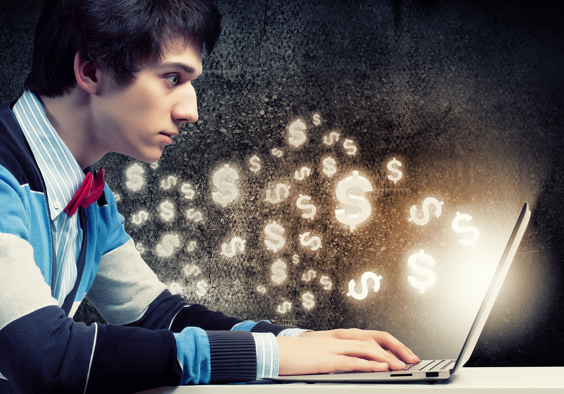 Man looking up Life Coach salary information on laptop