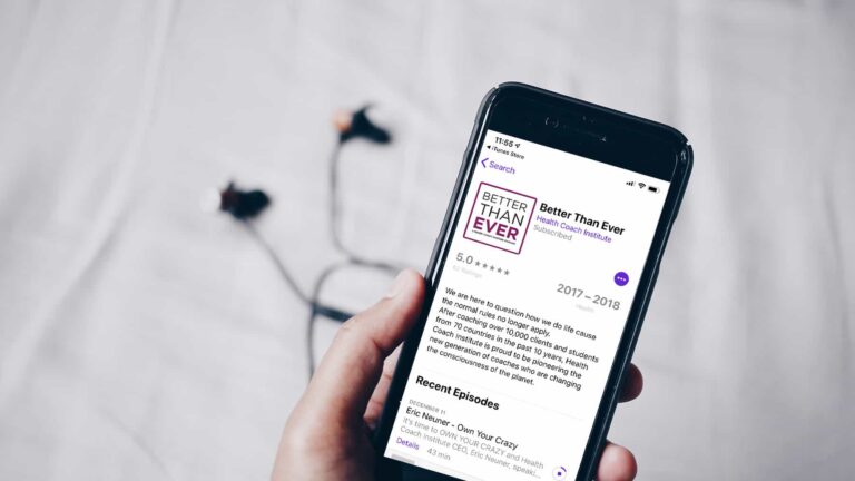 Phone playing Life Coach School podcast