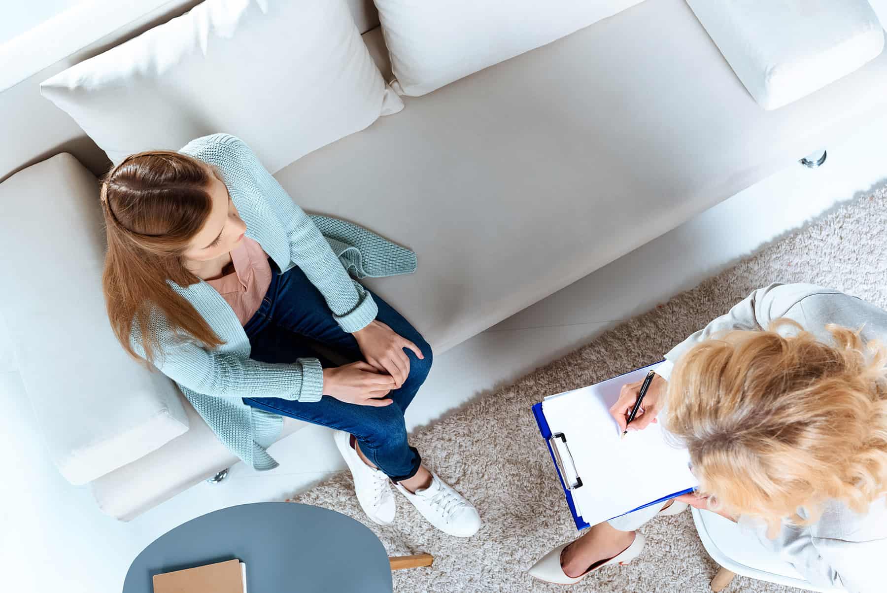wellness coach speaking to client
