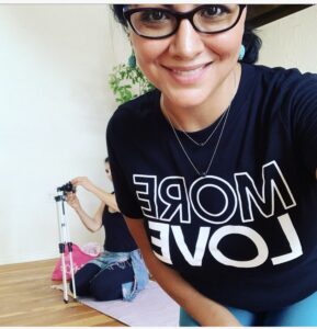 Health Coach Jocelyn Martinez wearing a teeshirt that says "Love More"